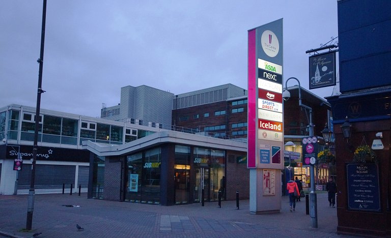 Large monolith with new LED lighting and branding at The Centre, Feltham