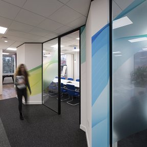 Coloured wave design digital prints across the wall and glass partitioning