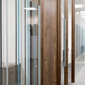 Multicoloured barcode vinyl on glass partitioning